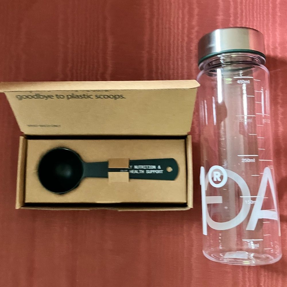New AG1 plastic bottle + scoop set by Athletic Greens Stainless Steel